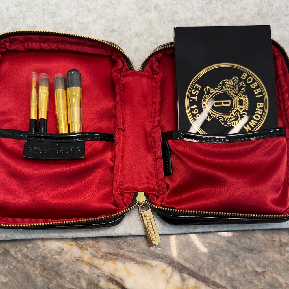 Bobbi Brown Black Makeup Bag with Vibrant Red Lining